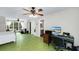 Expansive bedroom includes a work space, lounge, and en-suite bathroom, all in an open layout at 5348 Mccullough Dam Rd, Wadmalaw Island, SC 29487