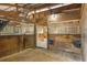A view of well-ventilated and maintained horse stalls, offering secure and comfortable housing for livestock at 5348 Mccullough Dam Rd, Wadmalaw Island, SC 29487
