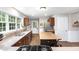 Well-equipped kitchen featuring stainless appliances, a center island, and hardwood floors at 5348 Mccullough Dam Rd, Wadmalaw Island, SC 29487