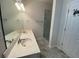 Bathroom featuring a large double sink vanity, framed mirror and walk-in shower at 7517 Whispering Oak Dr, Hanahan, SC 29410