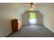 Neutral bedroom with vaulted ceiling, ceiling fan, and large window provides a serene space at 7517 Whispering Oak Dr, Hanahan, SC 29410