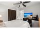 The bedroom features a ceiling fan and TV, complemented by closet storage at 7921 Cricket Ct # 305 E, North Charleston, SC 29418