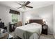 This bedroom offers a ceiling fan, a window with natural light, and a stylish desk area at 7921 Cricket Ct # 305 E, North Charleston, SC 29418