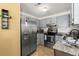 Kitchen with stainless steel appliances, granite countertops, and ample cabinet space at 7921 Cricket Ct # 305 E, North Charleston, SC 29418