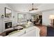 Open concept living and dining area with fireplace and plenty of seating at 7921 Cricket Ct # 305 E, North Charleston, SC 29418
