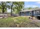 Large backyard with mature trees, a wood fence, and a picnic table at 809 O'Sullivan Dr, Mount Pleasant, SC 29464