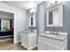 Bathroom features a double vanity with granite counters, and ample natural light at 809 O'Sullivan Dr, Mount Pleasant, SC 29464