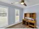 Bedroom with a ceiling fan, two windows, and a wood desk at 809 O'Sullivan Dr, Mount Pleasant, SC 29464