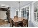 Eat-in kitchen features an adjacent formal dining room and brick fireplace at 809 O'Sullivan Dr, Mount Pleasant, SC 29464
