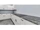 Renovated kitchen featuring granite counters, new cabinets, and new cooktop at 809 O'Sullivan Dr, Mount Pleasant, SC 29464