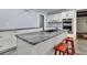 Island in updated kitchen features granite counters and stainless steel appliances at 809 O'Sullivan Dr, Mount Pleasant, SC 29464