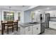 Modern eat-in kitchen features stainless steel appliances, granite countertops, and natural light at 809 O'Sullivan Dr, Mount Pleasant, SC 29464