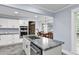 Open kitchen features granite countertops, stainless appliances, and breakfast nook at 809 O'Sullivan Dr, Mount Pleasant, SC 29464
