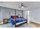 Spacious main bedroom boasts ample light, hard wood flooring, and a ceiling fan at 809 O'Sullivan Dr, Mount Pleasant, SC 29464