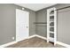 This walk-in closet has a closet rod installed and also built-in shelving at 809 O'Sullivan Dr, Mount Pleasant, SC 29464