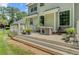 Multi-level backyard deck with seating and planters offers a great space for outdoor relaxation and entertainment at 9524 Markley Blvd, Summerville, SC 29485
