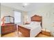 Cozy bedroom with wooden furniture, soft lighting, and a tranquil atmosphere at 9524 Markley Blvd, Summerville, SC 29485