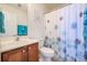 Bright bathroom with a single sink vanity, toilet, and shower/tub combination at 1003 Washitonia Way # A, Charleston, SC 29492