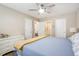 Spacious bedroom with neutral colors, ceiling fan, and ensuite bathroom access at 1003 Washitonia Way # A, Charleston, SC 29492