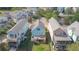 Aerial view of a blue house and backyard featuring a grill and a deck at 1022 Hunley Waters Cir, North Charleston, SC 29405