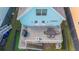 Aerial view of a blue house featuring a deck with a table and grill at 1022 Hunley Waters Cir, North Charleston, SC 29405