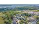 Scenic aerial shot of neighborhood homes near water and industrial area at 1022 Hunley Waters Cir, North Charleston, SC 29405