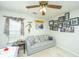 Bedroom featuring a ceiling fan, sofa and sports memorabilia art at 104 S Ansel Xing, Goose Creek, SC 29445