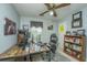 Functional home office with a spacious desk, ample storage, and natural light for productivity at 104 S Ansel Xing, Goose Creek, SC 29445
