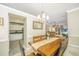 Kitchen/dining area with stainless appliances, and adjacent dining space with window views at 104 S Ansel Xing, Goose Creek, SC 29445