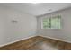 Bedroom with a large window and wood laminate floors at 105 Londonderry Rd, Goose Creek, SC 29445