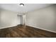 Bedroom with laminate floors and view of open closet at 105 Londonderry Rd, Goose Creek, SC 29445