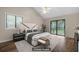 Cozy bedroom boasts a ceiling fan, warm colors, and access to a private outdoor space at 105 Londonderry Rd, Goose Creek, SC 29445