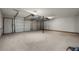 Spacious garage featuring two garage doors and ample lighting at 105 Londonderry Rd, Goose Creek, SC 29445