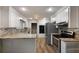 Spacious kitchen with stainless steel appliances, granite countertops, and natural light at 105 Londonderry Rd, Goose Creek, SC 29445