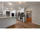 Modern kitchen with granite countertops, stainless appliances, and wood flooring at 105 Londonderry Rd, Goose Creek, SC 29445