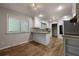 Modern kitchen with stainless steel appliances, granite countertops, and wooden floor at 105 Londonderry Rd, Goose Creek, SC 29445