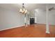 Spacious living room with a stone fireplace and hardwood flooring at 105 Londonderry Rd, Goose Creek, SC 29445