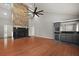 Hardwood floors, wet bar, stone fireplace and high ceilings enhance the large living space at 105 Londonderry Rd, Goose Creek, SC 29445