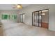 Sunroom boasts tiled flooring and glass doors, offering view into other rooms at 105 Londonderry Rd, Goose Creek, SC 29445