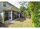 View of the backyard, with a screened-in porch at 1054 Bennington Dr, Charleston, SC 29492
