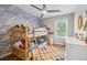 Cheerful ' bedroom with bunk beds, stylish wallpaper, and fun decor and a ceiling fan at 1054 Bennington Dr, Charleston, SC 29492