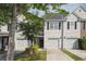 Charming townhouse featuring a one-car garage and tidy landscaping at 1054 Bennington Dr, Charleston, SC 29492