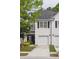 Charming townhouse featuring a one-car garage and tidy landscaping at 1054 Bennington Dr, Charleston, SC 29492