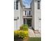 Charming entrance with blooming plants and covered front porch at 1054 Bennington Dr, Charleston, SC 29492