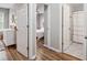 Hallway featuring LVP flooring, multiple doorways, and neutral walls at 1054 Bennington Dr, Charleston, SC 29492