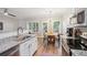 Kitchen area leading to the dining area with natural light at 1054 Bennington Dr, Charleston, SC 29492