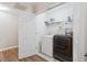 Conveniently located laundry room with washer, dryer, shelving, and storage space for supplies at 1054 Bennington Dr, Charleston, SC 29492