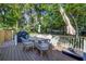 Outdoor deck features dining table and chairs for relaxing and entertaining at 1081 Groves Manor Ct, Mount Pleasant, SC 29464