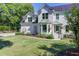 Charming home with a well-maintained lawn and meticulous landscaping at 1081 Groves Manor Ct, Mount Pleasant, SC 29464