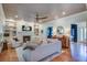 Inviting living room with a fireplace, built-in shelves, hardwood floors, and a comfortable seating arrangement at 1081 Groves Manor Ct, Mount Pleasant, SC 29464